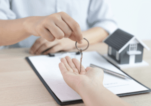 Landlord Giving the Key to the Tenant